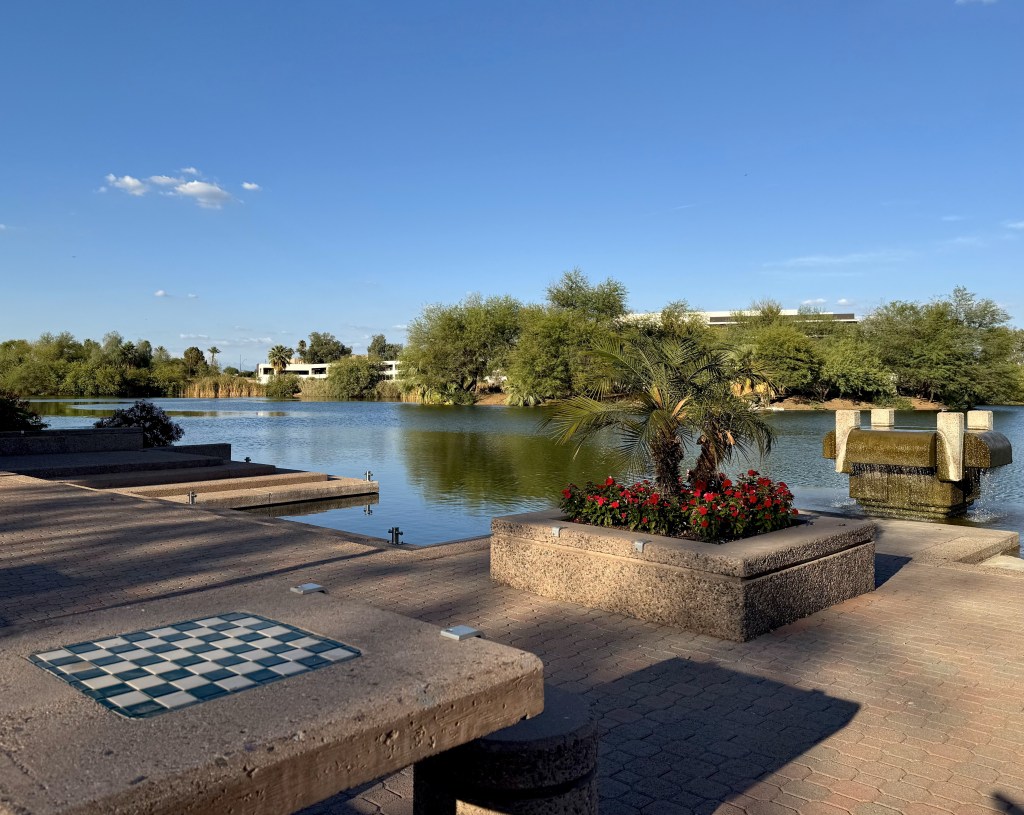A chess table along a lake