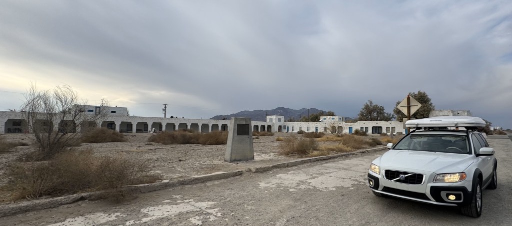 Volvo parked at a ghost town.