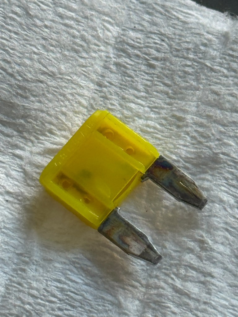 Popped fuse. Also incorrect size.