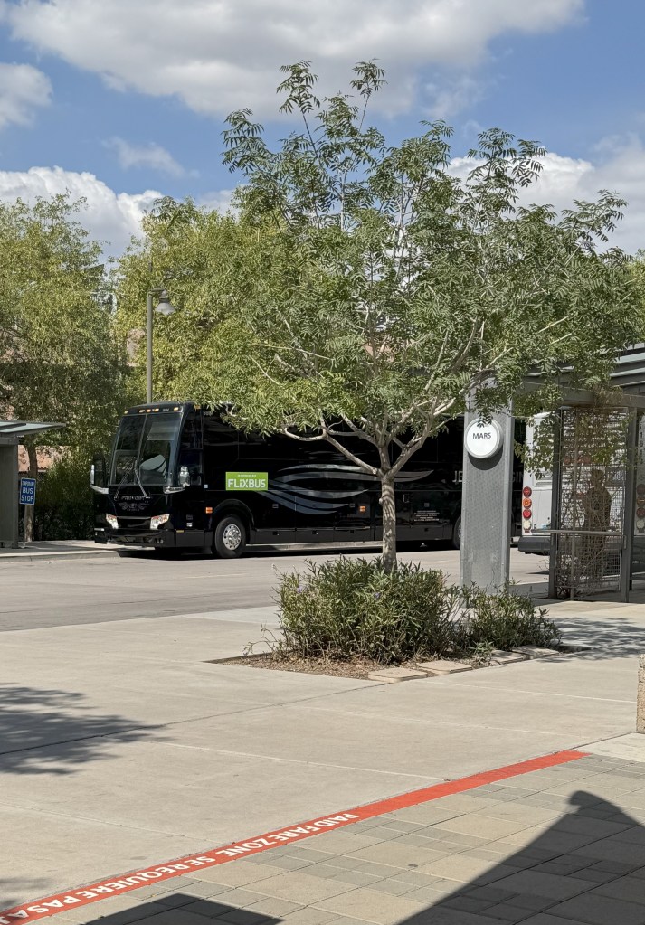A motorcoach waits to depart.