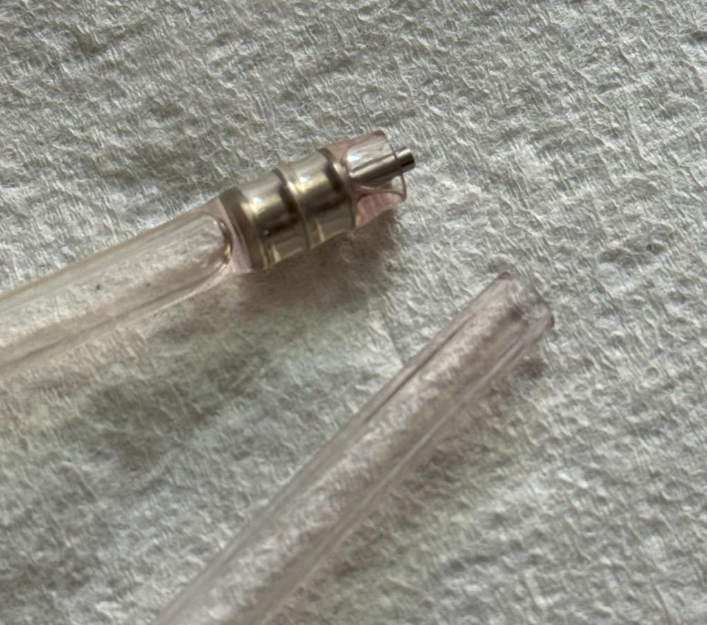 Bicycle brake bleed hose close up photo