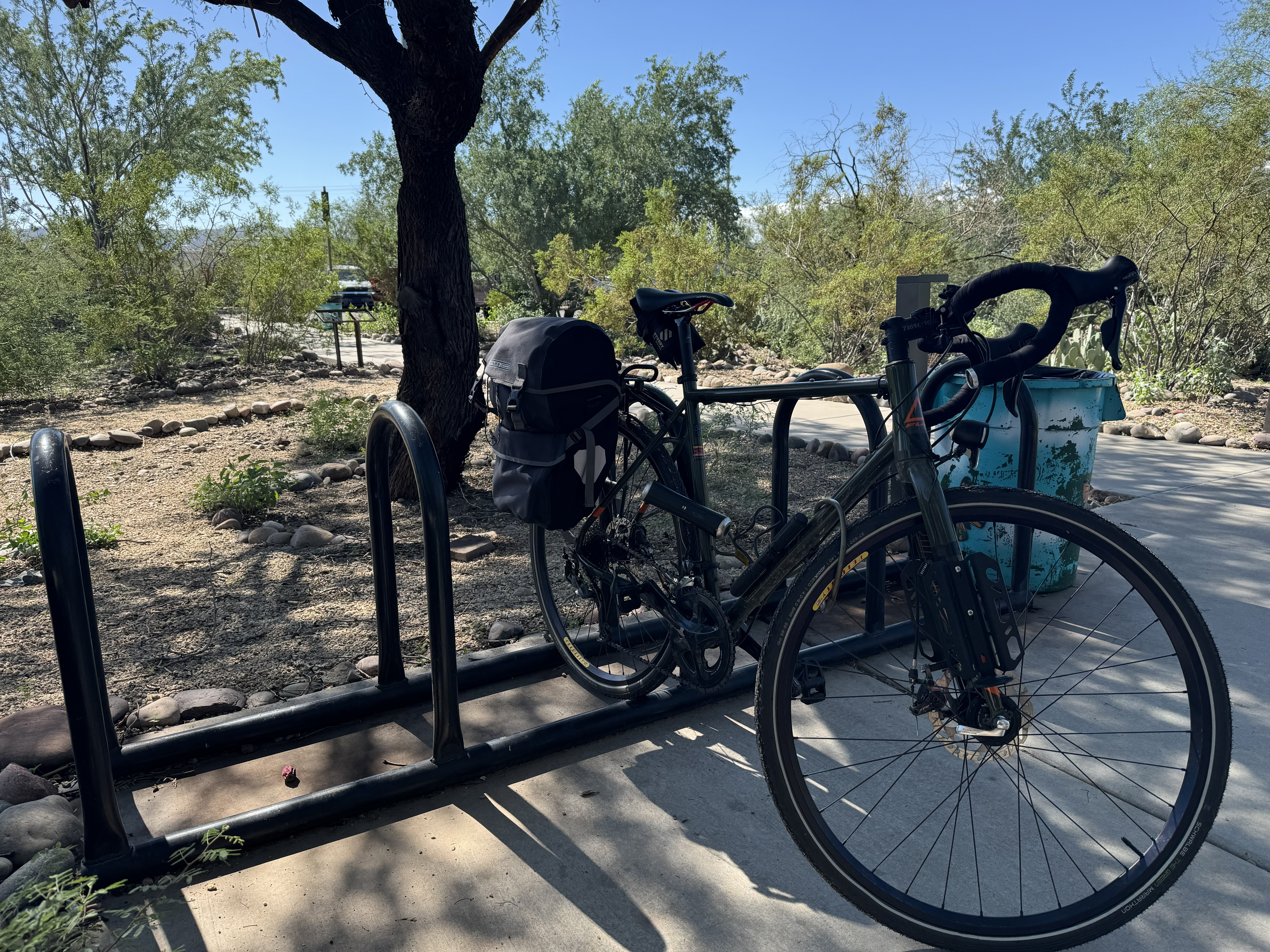 A bicycle locked up outside the Audubon Center