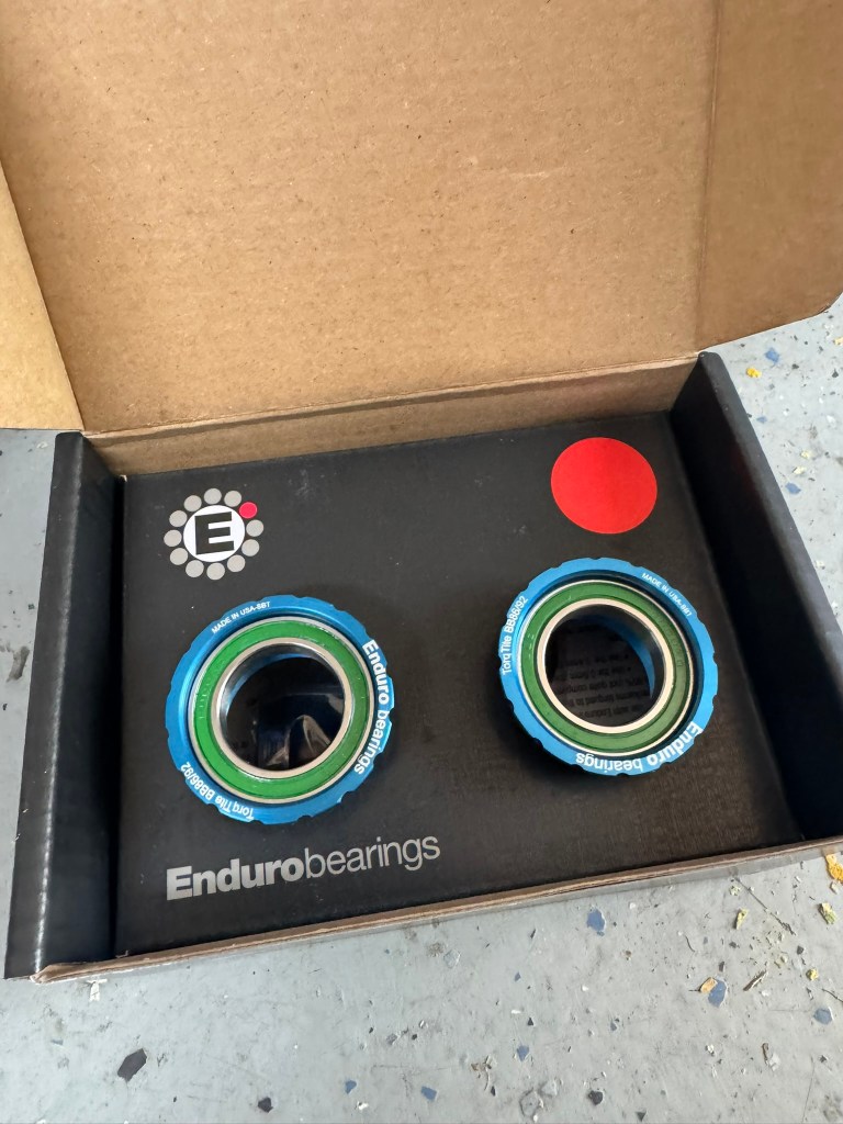 A blue bottom bracket from Enduro Bearings for Shimano applications