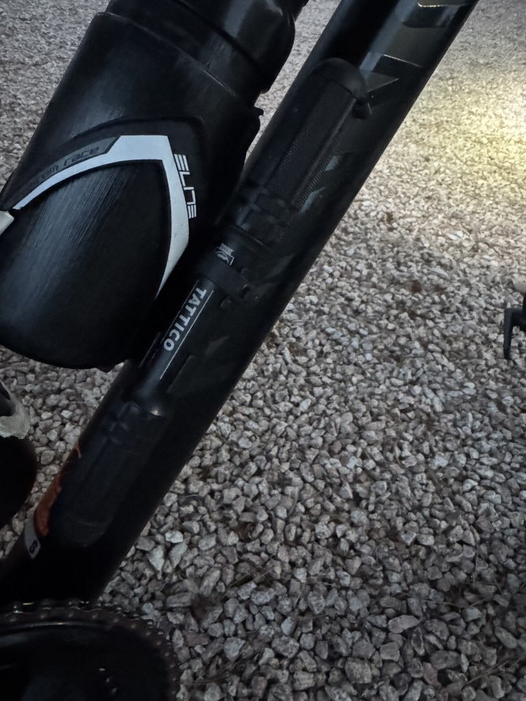 A Silca Tattico frame pump mounted onto a road bike frame