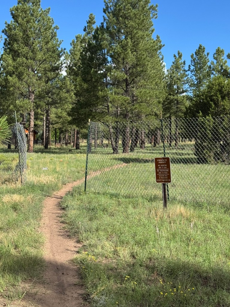 No trespassing signs along the Arizona Trail